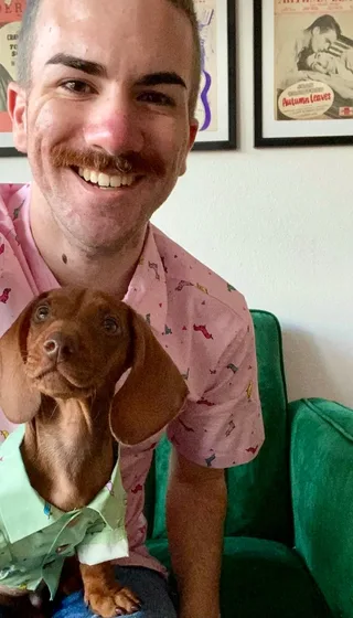 man and dachshund puppy in matching kook pooch shirts